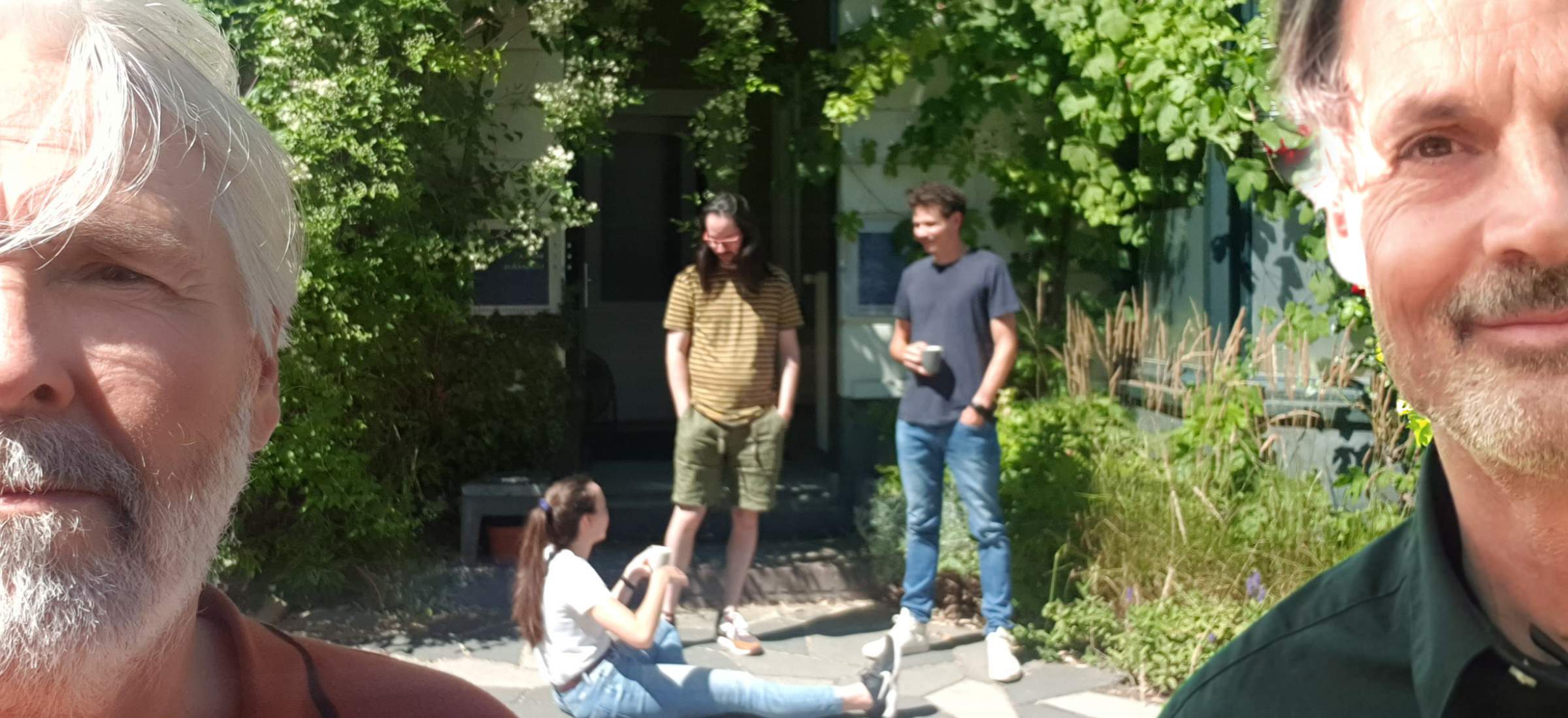 Team in front of office